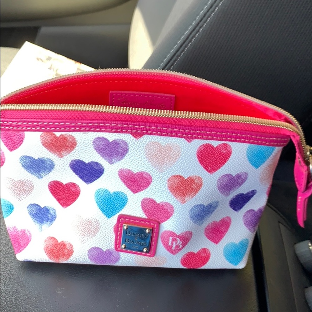 Dooney and Bourke makeup bag- white with hearts